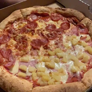 Half Hawaiian pizza and half pepperoni. Amazing!!!!!!