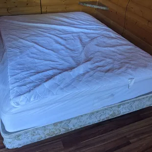 Gross bed, no linens. "Sold out of rental linens" was the excuse. We shoulda left immediately but the drive was too long for our kids.