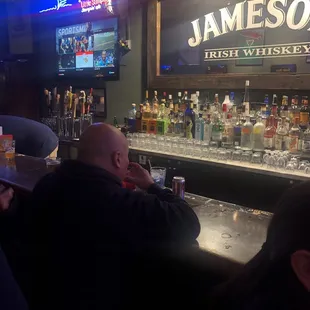 Asshole "helper" bartender.  All he wanted to do was pour himself another shot of Jameson.