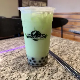 Honeydew milk tea with boba