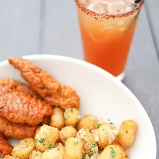 Chicken Tenders Plate with Tater Tots and our Pacific Michelada