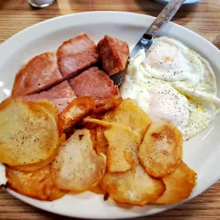 Ham steak with eggs and American fries