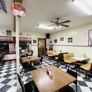 a man standing in a diner