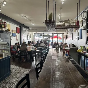 Inside of the cafe with full bar and a whole freshly made pastry counter!