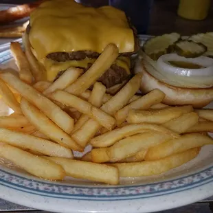 Big double cheeseburger and fries.