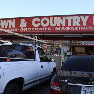 a truck parked in front of a store