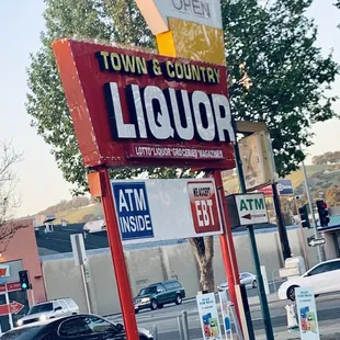 a sign for town and country liquors