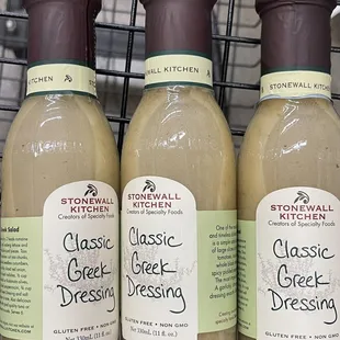 three bottles of classic greek dressing