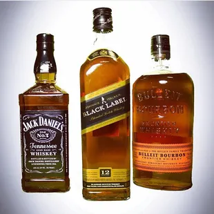 three bottles of whiskey