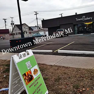 a sign in front of a store