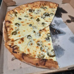 White Pizza with jalapenos.  Thin crust.