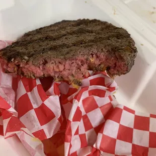 a sandwich in a styrofoam container