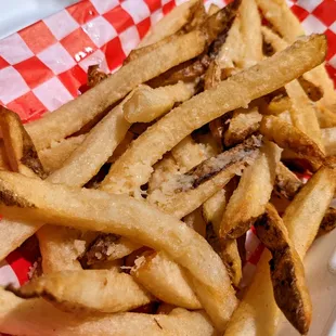 Truffle Parmesan Fries. Fresh-cut Idaho fries tossed with truffle oil and Parmesan cheese. $6.50.