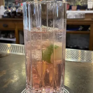 a drink in a tall glass
