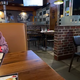 a woman sitting at a table