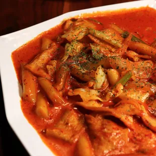 Spicy Rice Cakes in Rose Mala Sauce | IG @hotbuthungryasianguy