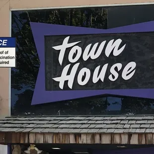 a sign with a bear on it