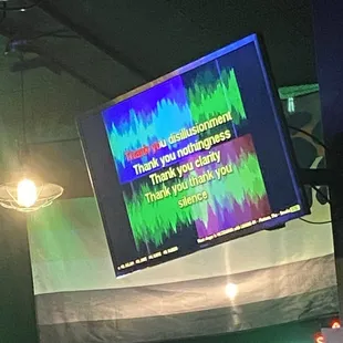 a tv screen with a quote on it