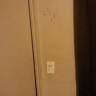 Knife wounds. Note lack of deadbolt. The catch is halfway kicked in as well