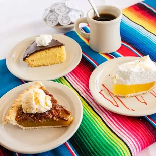 two plates of pies and a cup of coffee