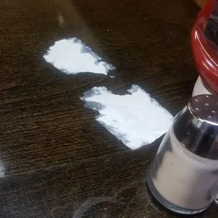 Dried paper stuck to table.