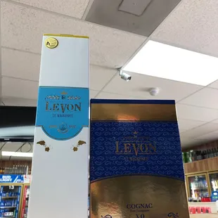 two boxes of liquor on a shelf