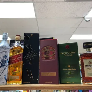a variety of liquors on a shelf
