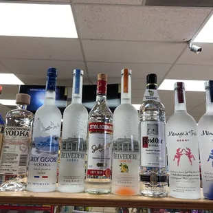 a variety of liquor bottles on a shelf