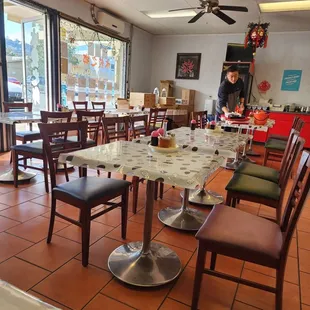 tables and chairs in a restaurant