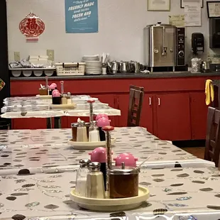 a restaurant with tables and chairs