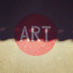 Red 'ART' circles on the sidewalk direct you towards galleries - Silver City was named one of the 100 Best Art Towns in America!