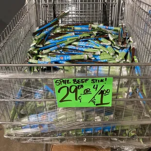 a shopping cart full of green beans