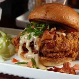 a fried chicken sandwich on a plate