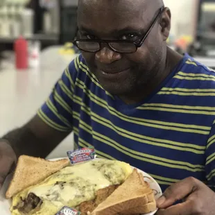 The Black Diamond about to dig into the Philly Cheese Omlett!