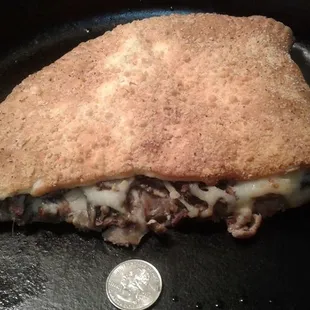 This is only half of the full Calzone offered by Towne Square Pizza. Your choice of three pizza toppings to make yours your way.