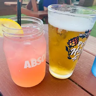 two drinks on a picnic table