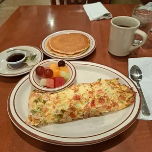 The great western omelet, pancakes, side of fruit and a cup of coffee, soooooo good.