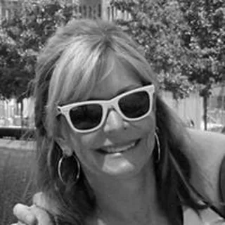 Lynn Dugle M.