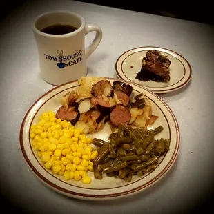 Sausage and potatoes with green beans and fancy corn, a Sunday special.