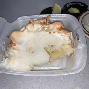 Coconut meringue pie. A bit too sweet. Crust not great because they don&apos;t make it.