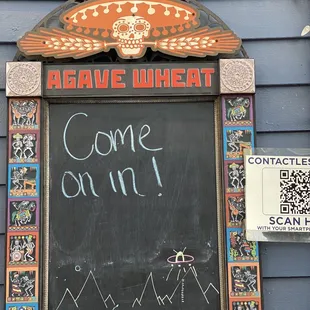 a chalkboard with a message on it