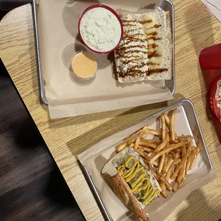 The Jerk with Creamy Cole slaw and The Cubano with fries