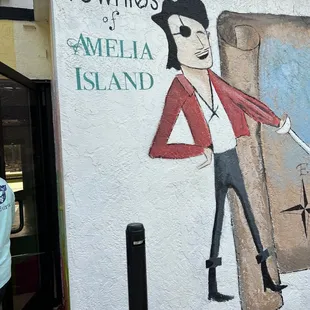 a man holding a pizza