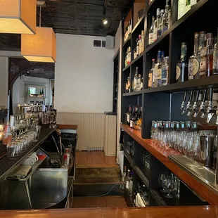 shelves of bottles and glasses