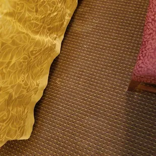 This floor is gross! I would have preferred to walk on concrete! Health department should shut this place down.