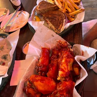 Chicken wings and Reuben sandwich