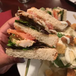 Crab and grump salad club sandwich