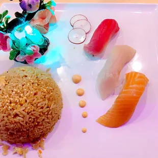 a plate of sushi and rice