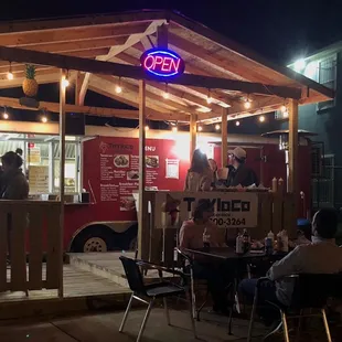 enjoying the weather and delicious tacos.