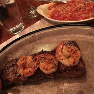 Valentine's special of small strip &amp; four shrimp, with spaghetti as a side.